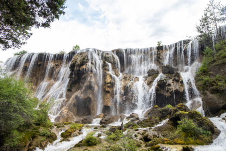 Pearl shoal waterfall in Jiuzhaigou national park during July.の写真素材
