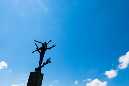 Statue of freedom under sunny blue sky at Lucern, Switzerland. Abstract background.のeditorial素材
