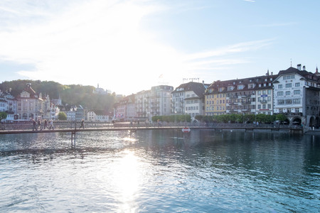 May 5, 2017 - Luzern, Switzerland: Rathaussteg, concrete bridge where people walk and ride bicycles across Reuss river.Shot in soft focus.のeditorial素材