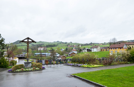 May 7, 2017 - Appenzell, Switzerland: Cross of Jesus in cemetery behind St. Mauritius Church.のeditorial素材