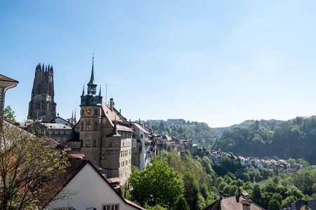 May 10, 2017 - Fribourg, Switzerland: Cityscape of Fribourg town with City Hall and The Gothic cathedral of St. Nicholas tower.のeditorial素材