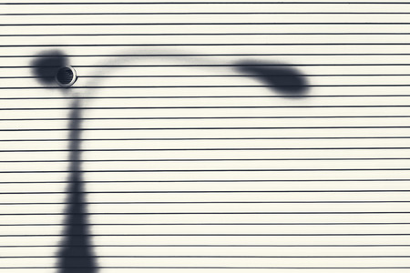 The door shutters. Bright white background-close-upの写真素材