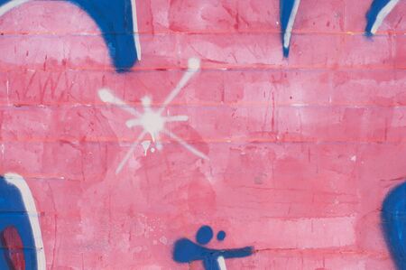 Pink brick wall background with white starの写真素材