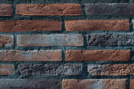 brown and gray grange brick wall backgroundの写真素材