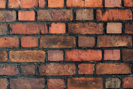 Old red brick wall. Background with retro brickの写真素材