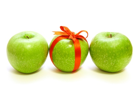  three apples on the white backgroundの写真素材