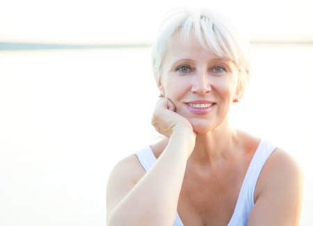 Portrait of positivity senior woman outdoorの写真素材
