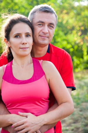 happy mature couple on green parkの写真素材