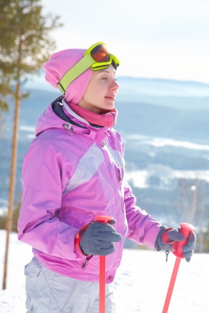 happy young woman on ski vacationの写真素材
