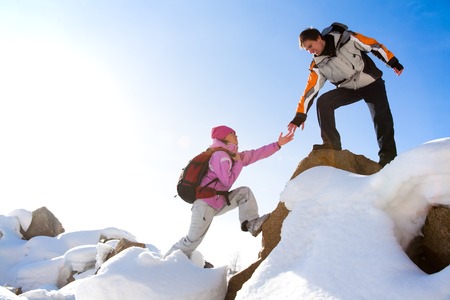 Two climbers ascend the mountainの写真素材