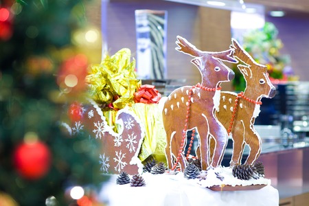 Christmas decorations home interior - chocolate sleigh with reindeer sledの写真素材