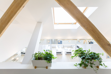 modern interior light a large apartment in mansardの写真素材