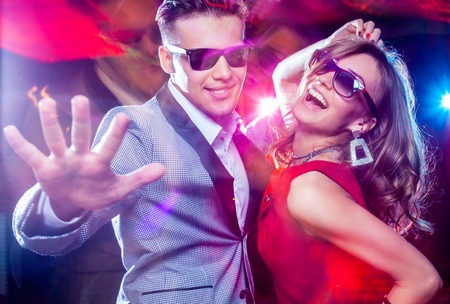 young couple having fun dancing at  party.
