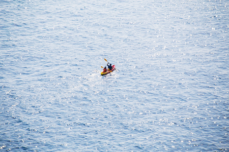 Kayaks. Couple kanoeing in the sea. People kayaking in the ocean.の写真素材