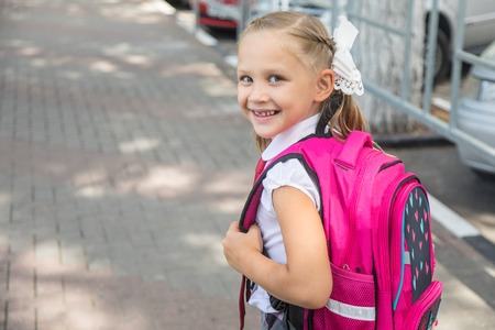 portrait of little girl  from primary school outdoor.  First-year student  in Day  First of Septemberの写真素材