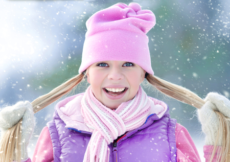 Portrait of blond young sporty woman in winterの写真素材