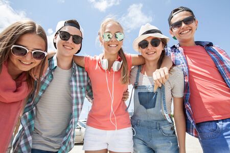 funny portrait of group of teenagers spending time together
