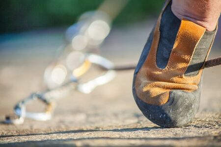 Rock climber's foot on rockの写真素材