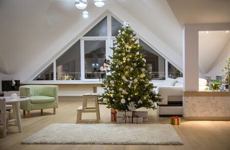 festively decorated home interior with Christmas treeの写真素材