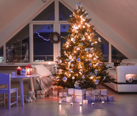 festively decorated home interior with Christmas treeの写真素材
