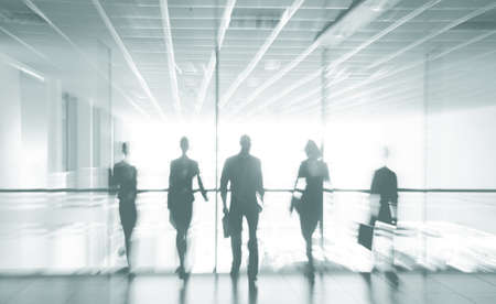 Group ofl silhouettes of businesspeople comunications background business centerの写真素材