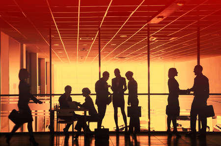 Group ofl silhouettes of businesspeople comunications background business centerの写真素材