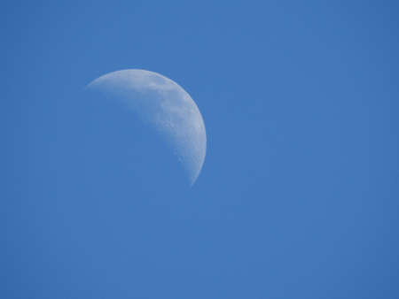 moon in the blue sky during the dayの写真素材