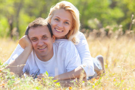 middle aged couple enjoying life together on natureの写真素材