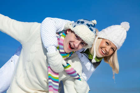 Attractive young couple having fun winter timeの写真素材