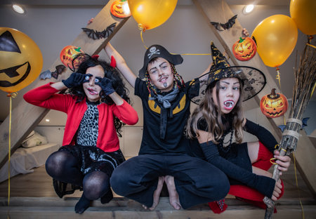 little kids celebrates halloween at homeの写真素材