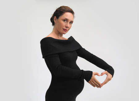 Young beautiful pregnant woman waiting for the birth of her baby.の写真素材