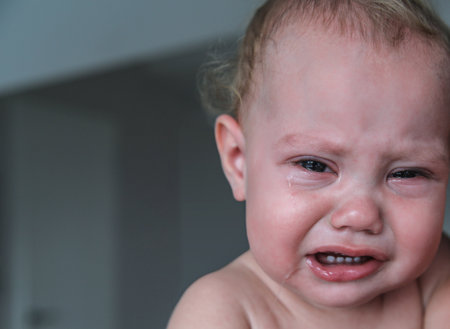 newborn baby crying alone