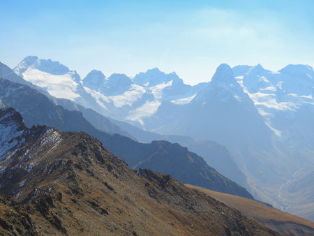landscape of tops of the snowy mountainsの写真素材