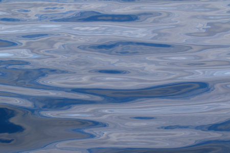 beautiful range of blue shades on the wavy sea water surface.の写真素材