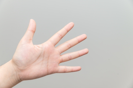 Human hand with open palm playing rockの写真素材