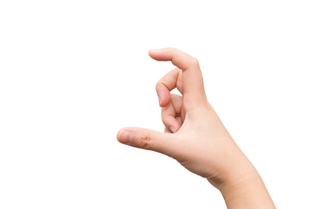 Human hand holding imaginary card with two fingers on light gray backgroundの写真素材