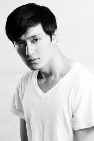 Portrait of handsome young man with cool pose, black and white styleの写真素材