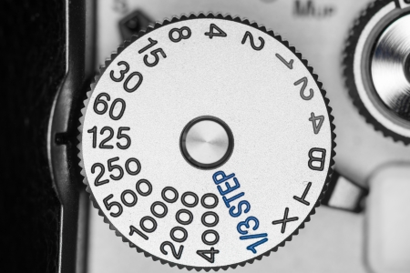 Shutter speed dial on a old style single lens reflex SLR cameraの写真素材