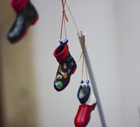 Small shoes on the ropeの写真素材
