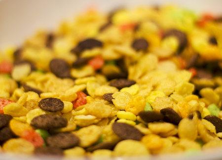 Corn flakes and chocolate flakes for breakfast. Selective focus