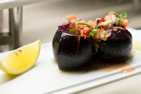 Beet Stuffed with Vegetables with Lemon Sliceの写真素材