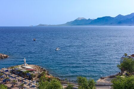 Mediterranean landscape in Antalya. View of the mountains, sea, yachts and city - Antalya, Turkey, 04.23.2019のeditorial素材