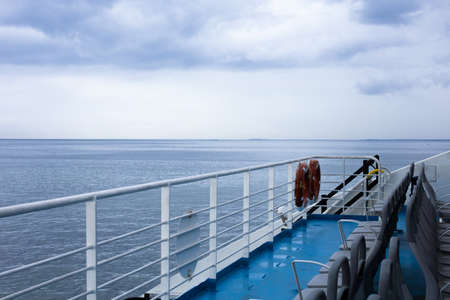 City view of Izmir from the ferryboat. Cold gray winter