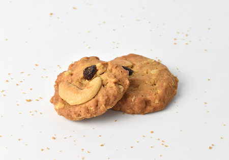 Cashews and Raisins cookies on a white backgroundの写真素材