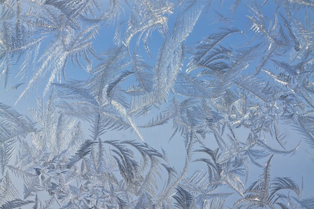 The abstract frosty pattern on glassの写真素材