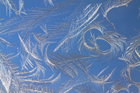 The abstract frosty pattern on glass