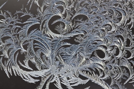 The abstract frosty pattern on glass