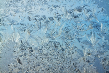 abstract background from frosty pattern on glassの写真素材