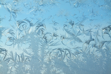abstract background from frosty pattern on glassの写真素材