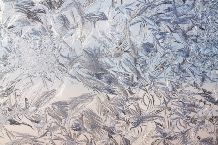 abstract background from frosty pattern on glassの写真素材